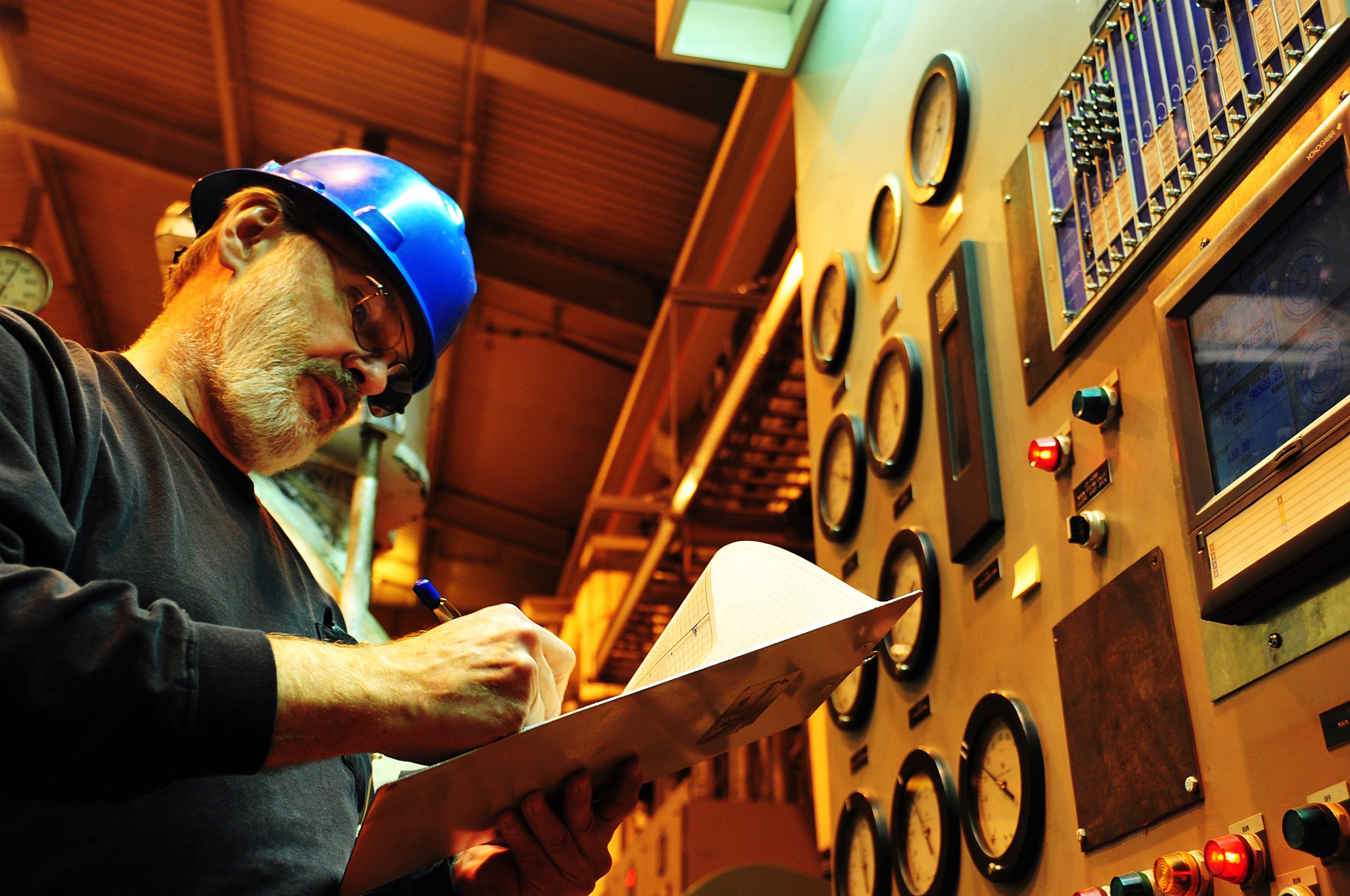 Man checking control panels