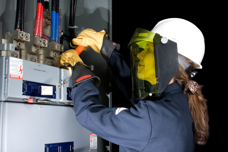 Operator performing equipment maintenance during Electrical Fundamentals Training