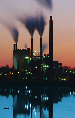 Coal Power Plant at Dusk with smokestacks